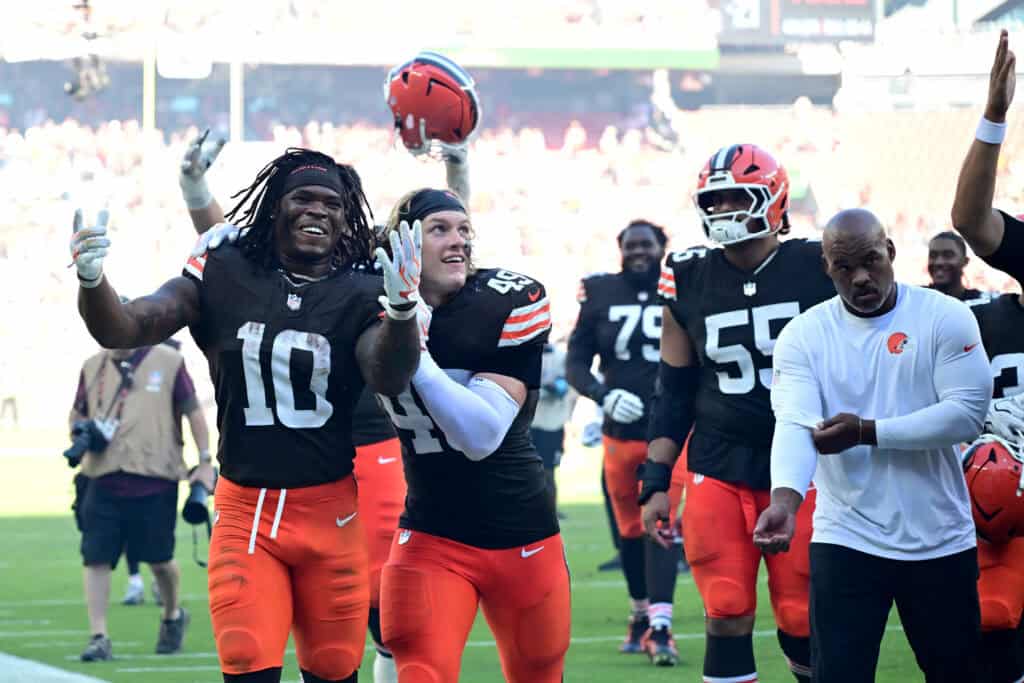 CLEVELAND, OHIO - SEPTEMBER 27: Quinshon Judkins #10 and Carson Schwesinger #49 of the Cleveland Browns celebrate the 21-18 win against the Carolina Panthers at Huntington Bank Field on September 27, 2026 in Cleveland, Ohio.