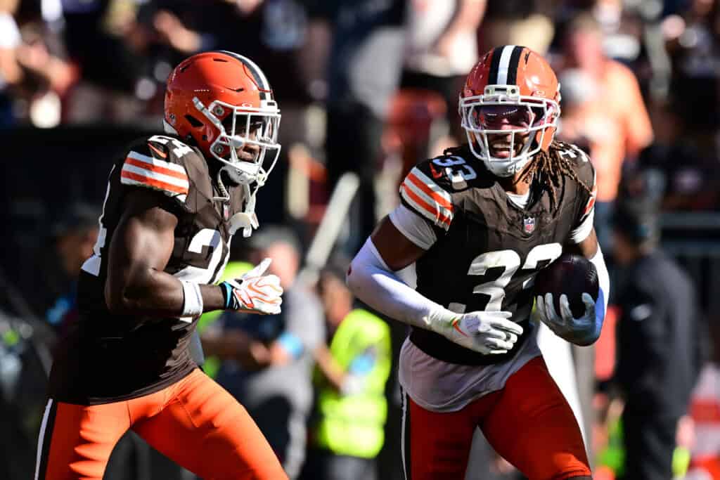 CLEVELAND, OHIO - SEPTEMBER 27: Ronnie Hickman #33 of the Cleveland Browns is congratulated by Daniel Thomas #24 after intercepting a pass against the Carolina Panthers during the fourth quarter at Huntington Bank Field on September 27, 2026 in Cleveland, Ohio.