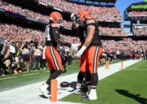 CLEVELAND, OHIO - SEPTEMBER 27: Harold Fannin Jr. #44 of the Cleveland Browns is congratulated by Austin Barber #58 after scoring a touchdown reception against the Carolina Panthers during the second quarter at Huntington Bank Field on September 27, 2026 in Cleveland, Ohio.