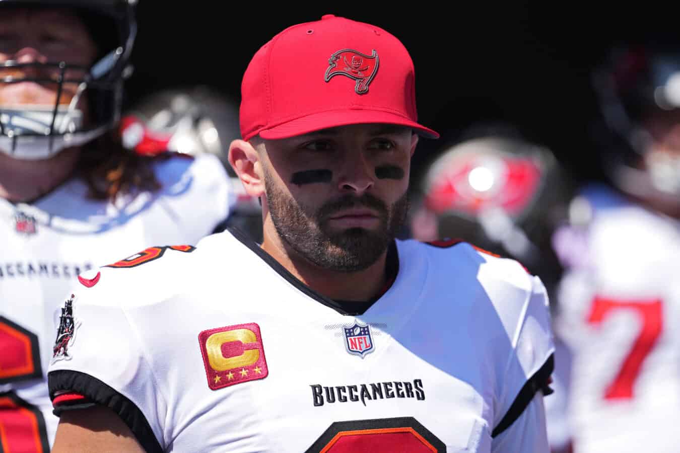 CINCINNATI, OHIO - SEPTEMBER 13: Baker Mayfield #6 of the Tampa Bay Buccaneers looks on with teammates prior to an NFL game against the Cincinnati Bengals at Paycor Stadium on September 13, 2026 in Cincinnati, Ohio.