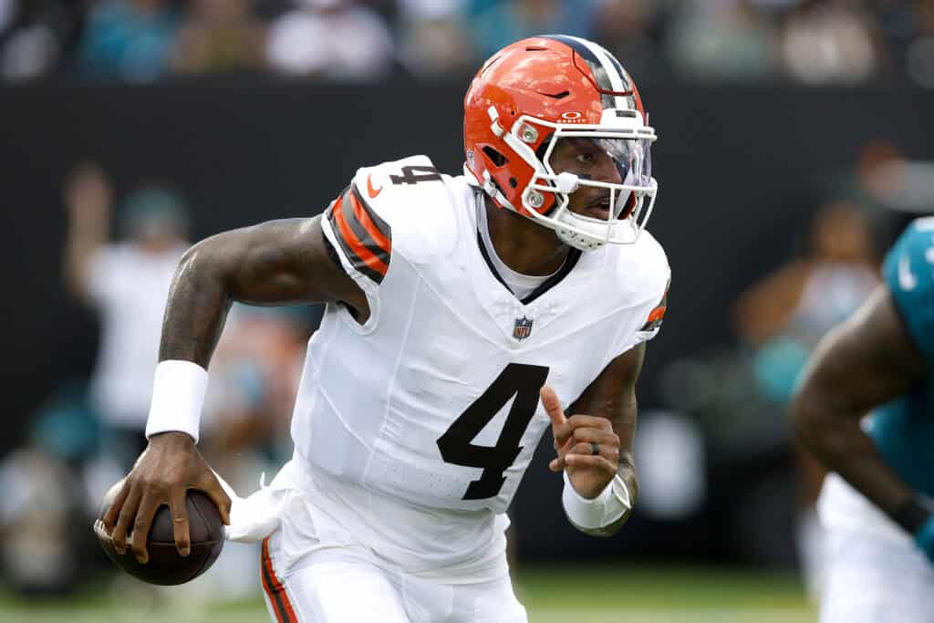 JACKSONVILLE, FLORIDA - SEPTEMBER 13: Deshaun Watson #4 of the Cleveland Browns scrambles with the ball against the Jacksonville Jaguars during the first quarter of the game at EverBank Stadium on September 13, 2026 in Jacksonville, Florida.