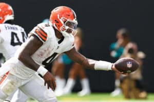 JACKSONVILLE, FLORIDA - SEPTEMBER 13: Deshaun Watson #4 of the Cleveland Browns hands the ball off against the Jacksonville Jaguars during the fourth quarter of the game at EverBank Stadium on September 13, 2026 in Jacksonville, Florida.