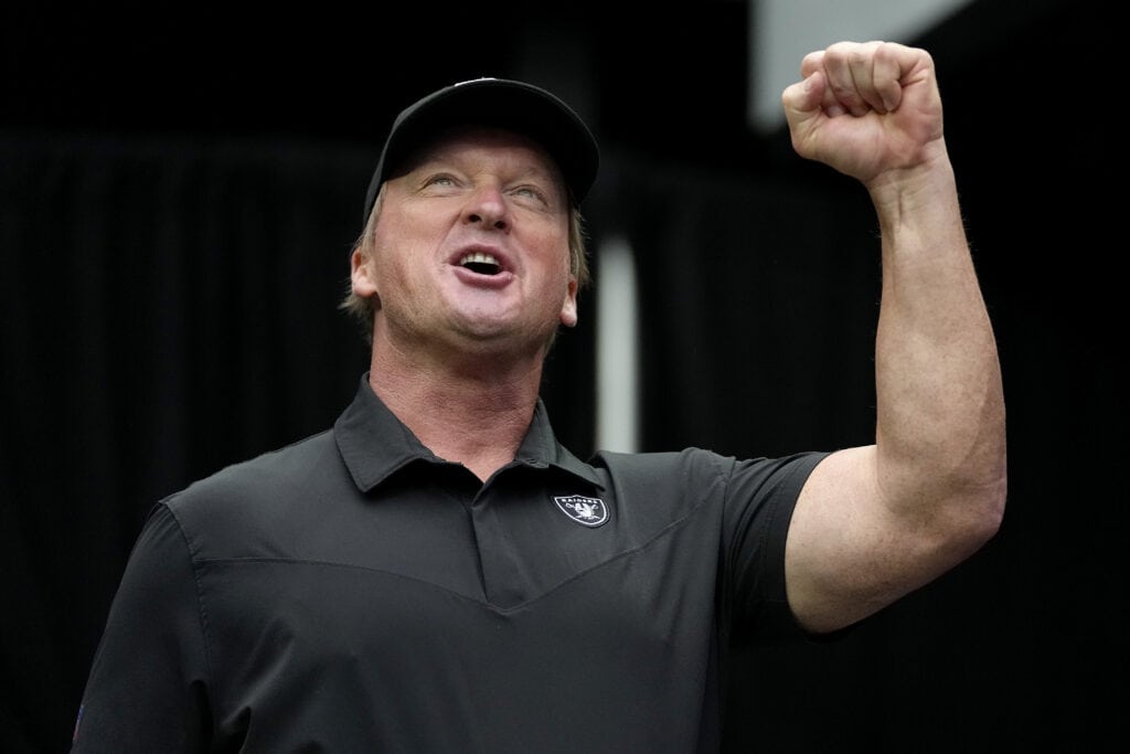 LAS VEGAS, NEVADA - OCTOBER 10: Head coach John Gruden of the Las Vegas Raiders reacts before a game against the Chicago Bears at Allegiant Stadium on October 10, 2021 in Las Vegas, Nevada.