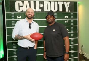 LAS VEGAS, NEVADA - APRIL 27: (L-R) Mike Golic Jr. and Brandon Newman attend Call of Duty: Modern Warfare II event at the 2022 NFL Draft on April 27, 2022 in Las Vegas, Nevada.