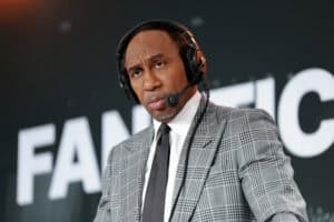 NEW YORK, NEW YORK - JULY 17: Stephen A. Smith speaks on stage as Stephen A. Smith and Christopher Russo host SiriusXM shows live from Fanatics Fest at Javits Center on July 17, 2026 in New York City.