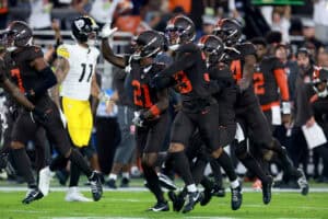 CLEVELAND, OHIO - OCTOBER 01: Denzel Ward #21 of the Cleveland Browns celebrates with his teammates after an interception against Aaron Rodgers #8 of the Pittsburgh Steelers during the first quarter of the game at Huntington Bank Field on October 01, 2026 in Cleveland, Ohio.