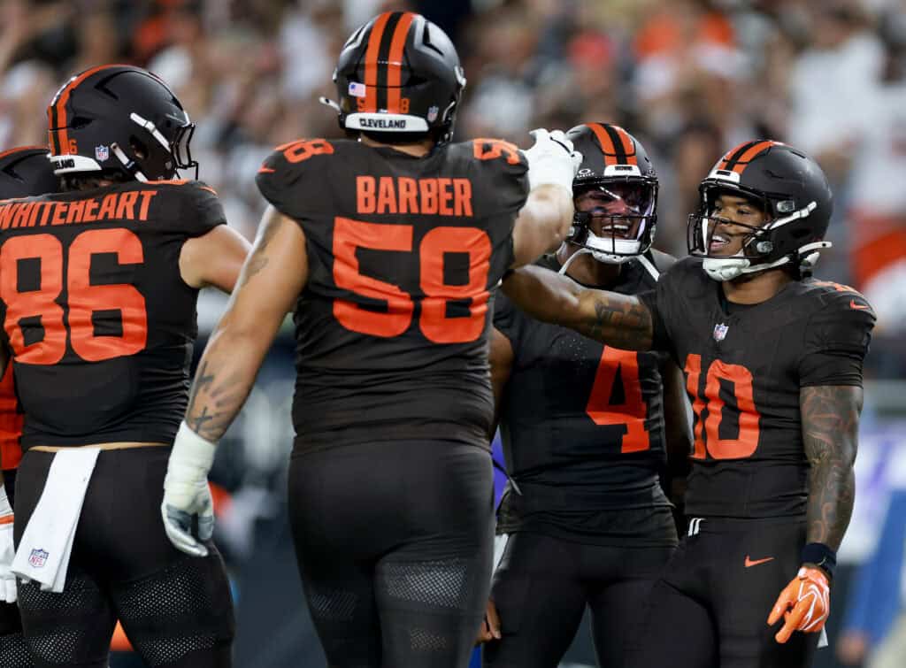 CLEVELAND, OHIO - OCTOBER 01: Quinshon Judkins #10 of the Cleveland Browns celebrates with Deshaun Watson #4, Blake Whiteheart #86 and Austin Barber #58 after scoring a touchdown against the Pittsburgh Steelers during the second quarter of the game at Huntington Bank Field on October 01, 2026 in Cleveland, Ohio