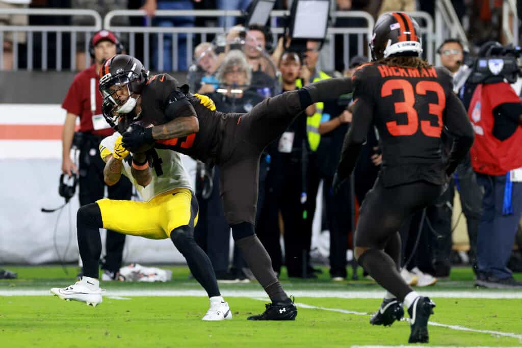 CLEVELAND, OHIO - OCTOBER 01: Grant Delpit #9 of the Cleveland Browns intercepts a pass intended for Roman Wilson #14 of the Pittsburgh Steelers during the fourth quarter of the game at Huntington Bank Field on October 01, 2026 in Cleveland, Ohio.