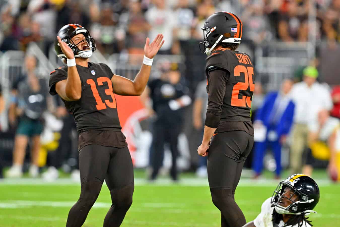 CLEVELAND, OHIO - OCTOBER 01: Punter Corey Bojorquez #13 and placekicker Andre Szmyt #25 of the Cleveland Browns celebrate after they hit a 54-yard game-winning field goal during the fourth quarter against the Pittsburgh Steelers at Huntington Bank Field on October 01, 2026 in Cleveland, Ohio.