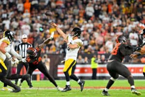 CLEVELAND, OHIO - OCTOBER 01: Quarterback Aaron Rodgers #8 of the Pittsburgh Steelers passes over linebacker Sam Williams #54 of the Cleveland Browns during the third quarter at Huntington Bank Field on October 01, 2026 in Cleveland, Ohio.