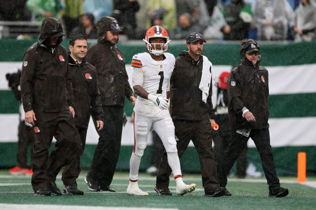 EAST RUTHERFORD, NEW JERSEY - OCTOBER 11: Kc Concepcion #1 of the Cleveland Browns walks off the field with the medical staff during the first quarter of the game against the New York Jets at MetLife Stadium on October 11, 2026 in East Rutherford, New Jersey.