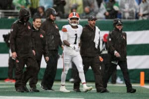 EAST RUTHERFORD, NEW JERSEY - OCTOBER 11: Kc Concepcion #1 of the Cleveland Browns walks off the field with the medical staff during the first quarter of the game against the New York Jets at MetLife Stadium on October 11, 2026 in East Rutherford, New Jersey.