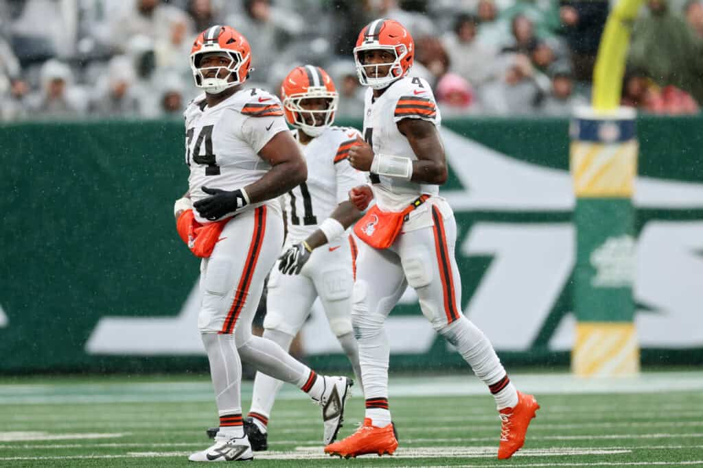 EAST RUTHERFORD, NEW JERSEY - OCTOBER 11: Deshaun Watson #4 of the Cleveland Browns runs off the field with teammates during the second quarter of the game against the New York Jets at MetLife Stadium on October 11, 2026 in East Rutherford, New Jersey.
