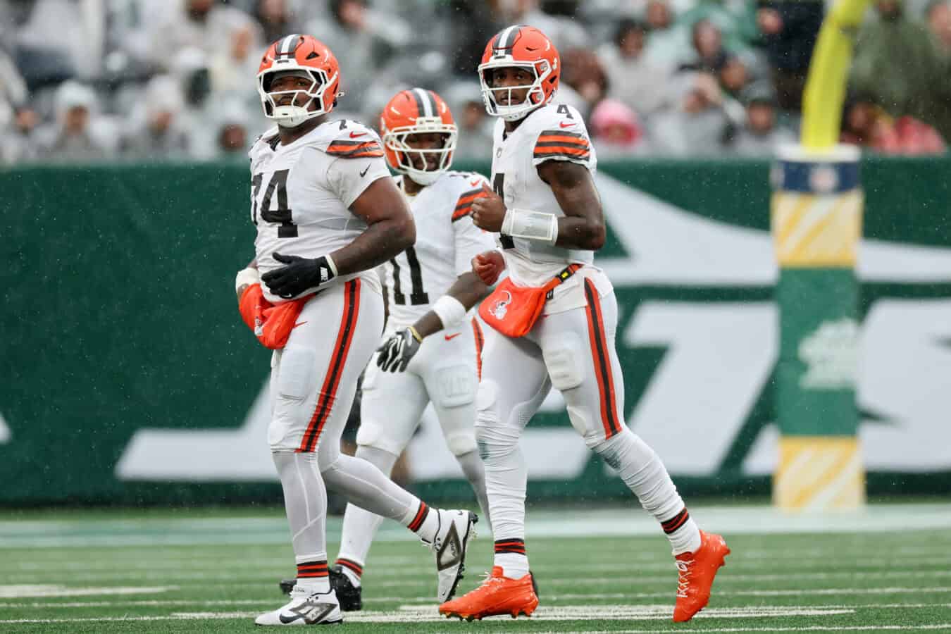 EAST RUTHERFORD, NEW JERSEY - OCTOBER 11: Deshaun Watson #4 of the Cleveland Browns runs off the field with teammates during the second quarter of the game against the New York Jets at MetLife Stadium on October 11, 2026 in East Rutherford, New Jersey.