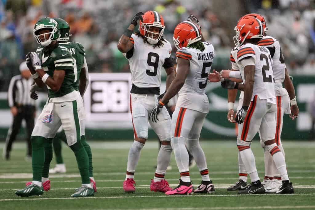 EAST RUTHERFORD, NEW JERSEY - OCTOBER 11: Grant Delpit #9 and Quincy Williams #5 of the Cleveland Browns celebrate during the second quarter of the game against the New York Jets at MetLife Stadium on October 11, 2026 in East Rutherford, New Jersey.