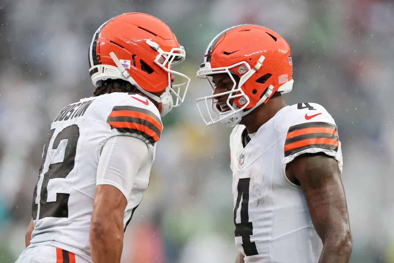 EAST RUTHERFORD, NEW JERSEY - OCTOBER 11: Deshaun Watson #4 and Denzel Boston #12 of the Cleveland Browns celebrate after scoring a touchdown during the fourth quarter of the game against the New York Jets at MetLife Stadium on October 11, 2026 in East Rutherford, New Jersey.
