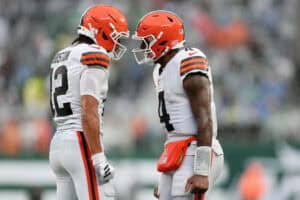 EAST RUTHERFORD, NEW JERSEY - OCTOBER 11: Deshaun Watson #4 and Denzel Boston #12 of the Cleveland Browns celebrate after a touchdown during the fourth quarter of the game against the New York Jets at MetLife Stadium on October 11, 2026 in East Rutherford, New Jersey.