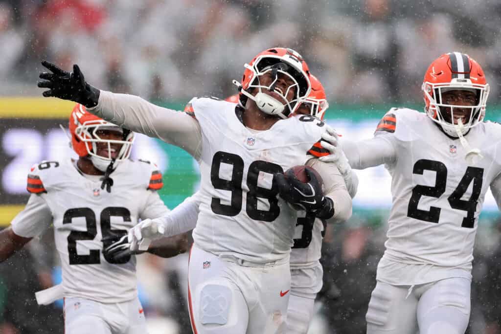 EAST RUTHERFORD, NEW JERSEY - OCTOBER 11: Adin Huntington #98 of the Cleveland Browns celebrates after recovering a fumble during the fourth quarter of the game against the New York Jets at MetLife Stadium on October 11, 2026 in East Rutherford, New Jersey.