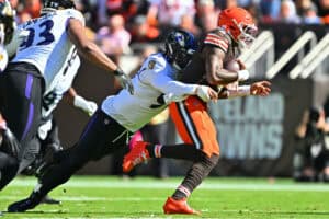 CLEVELAND, OHIO - OCTOBER 18: Trey Hendrickson #91 of the Baltimore Ravens sacks Deshaun Watson #4 of the Cleveland Browns during the first quarter of the game at Huntington Bank Field on October 18, 2026 in Cleveland, Ohio.