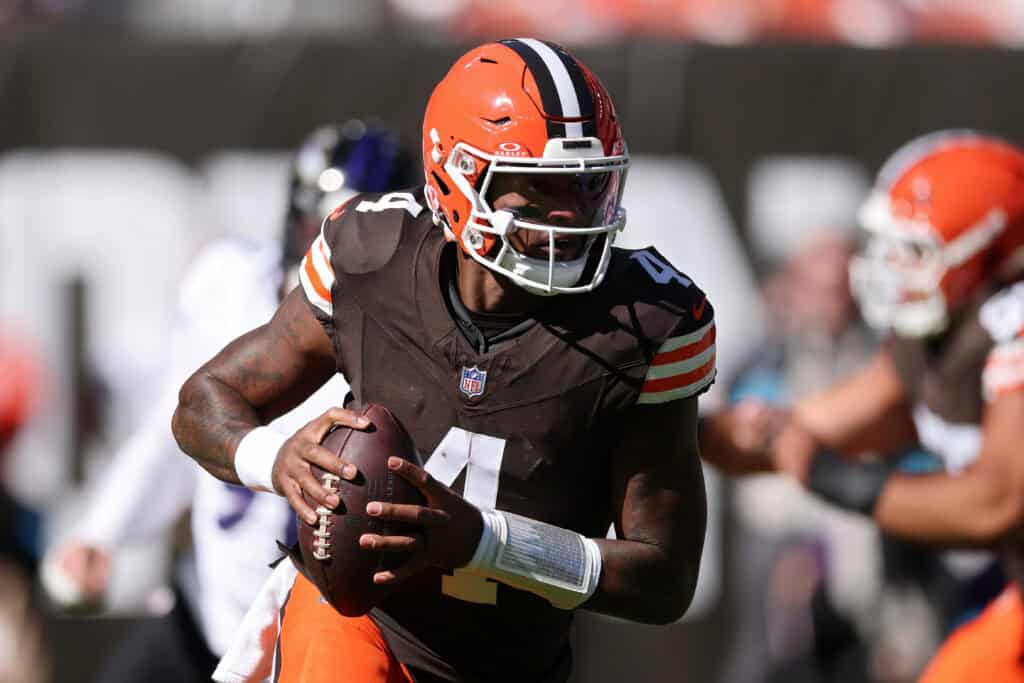 CLEVELAND, OHIO - OCTOBER 18: Deshaun Watson #4 of the Cleveland Browns scrambles against the Baltimore Ravens during the second quarter of the game at Huntington Bank Field on October 18, 2026 in Cleveland, Ohio.