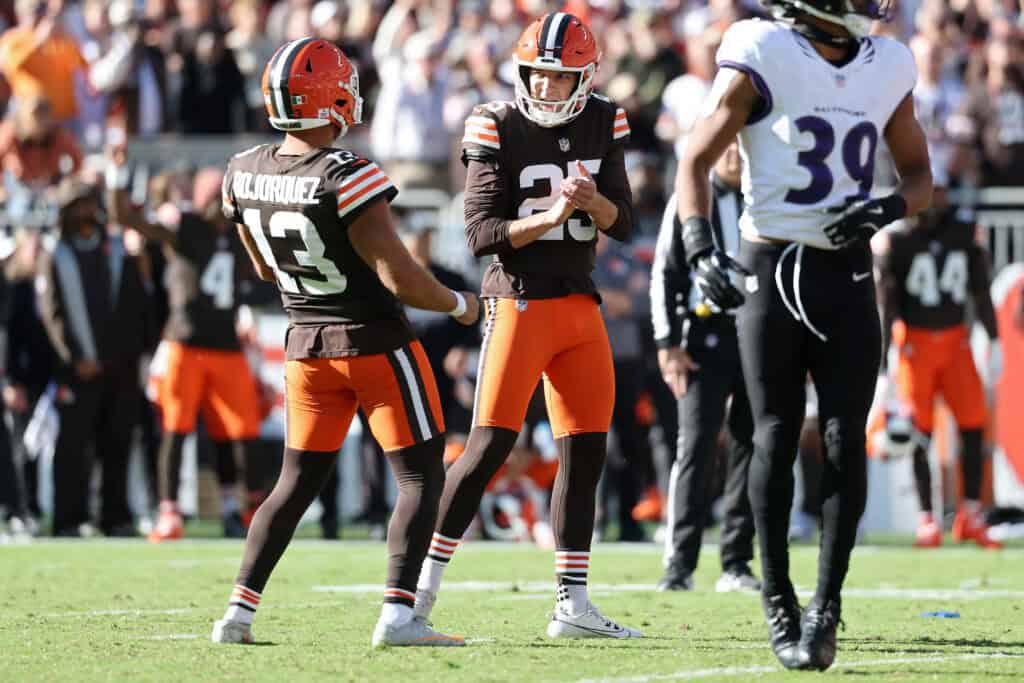 CLEVELAND, OHIO - OCTOBER 18: Andre Szmyt #25 of the Cleveland Browns celebrates with Corey Bojorquez #13 after kicking the game winning field goal to defeat the Baltimore Ravens in the game at Huntington Bank Field on October 18, 2026 in Cleveland, Ohio.