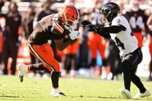 CLEVELAND, OHIO - OCTOBER 18: KC Concepcion #1 of the Cleveland Browns runs with the ball against Marlon Humphrey #44 of the Baltimore Ravens during the fourth quarter of the game at Huntington Bank Field on October 18, 2026 in Cleveland, Ohio.