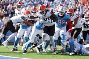 NASHVILLE, TENNESSEE - OCTOBER 25: Quinshon Judkins #10 of the Cleveland Browns scores a touchdown against Anthony Hill Jr. #53 of the Tennessee Titans during the second quarter at Nissan Stadium on October 25, 2026 in Nashville, Tennessee.