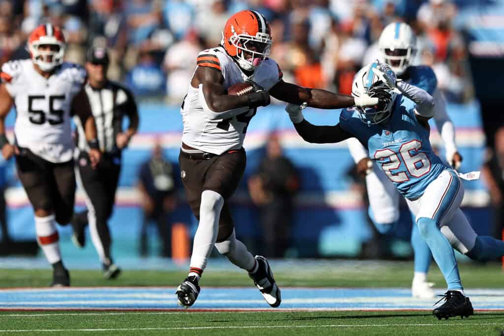 NASHVILLE, TENNESSEE - OCTOBER 25: Harold Fannin Jr. #44 of the Cleveland Browns carries the ball against Kevin Winston Jr. #23 of the Tennessee Titans during the second half at Nissan Stadium on October 25, 2026 in Nashville, Tennessee. (