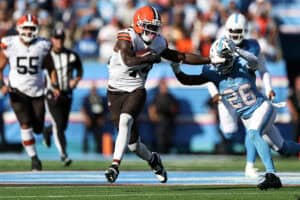 NASHVILLE, TENNESSEE - OCTOBER 25: Harold Fannin Jr. #44 of the Cleveland Browns carries the ball against Kevin Winston Jr. #23 of the Tennessee Titans during the second half at Nissan Stadium on October 25, 2026 in Nashville, Tennessee. (