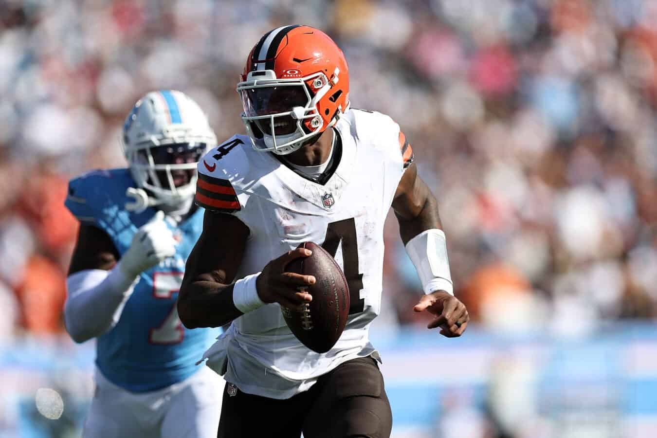 NASHVILLE, TENNESSEE - OCTOBER 25: Deshaun Watson #4 of the Cleveland Browns carries the ball against Oluwafemi Oladejo #7 of the Tennessee Titans d2h at Nissan Stadium on October 25, 2026 in Nashville, Tennessee.