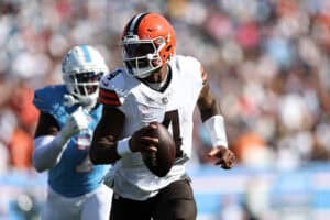 NASHVILLE, TENNESSEE - OCTOBER 25: Deshaun Watson #4 of the Cleveland Browns carries the ball against Oluwafemi Oladejo #7 of the Tennessee Titans d2h at Nissan Stadium on October 25, 2026 in Nashville, Tennessee.