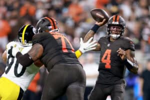 CLEVELAND, OHIO - OCTOBER 01: Deshaun Watson #4 of the Cleveland Browns throws a touchdown pass to Harold Fannin Jr. #44 against the Pittsburgh Steelers during the second quarter of the game at Huntington Bank Field on October 01, 2026 in Cleveland, Ohio