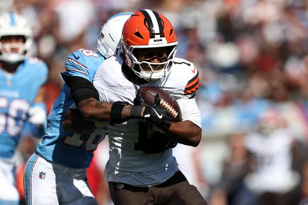 NASHVILLE, TENNESSEE - OCTOBER 25: Kc Concepcion #1 of the Cleveland Browns carries the ball against Cor'dale Flott #18 of the Tennessee Titans during the first half at Nissan Stadium on October 25, 2026 in Nashville, Tennessee.