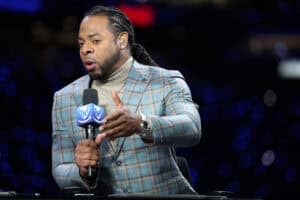 SEATTLE, WASHINGTON - DECEMBER 18: Richard Sherman looks on during halftime of a game between the Los Angeles Rams and the Seattle Seahawks at Lumen Field on December 18, 2025 in Seattle, Washington.